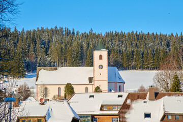 view of baroque Church of St. John in the center of Breitnau in the Black Forest, Baden-Wurttemberg, Germany