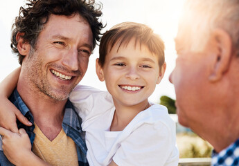 Great role models from boyhood to manhood. Shot of a young boy spending time with his father and...