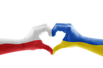 Two hands in the form of heart with Polish and Ukrainian flag isolated on white background