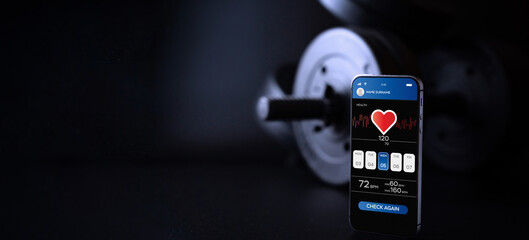 Health app. Smart phone screen with fitness health or sport gym mobile application on black...