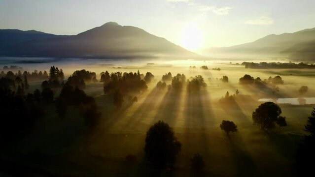 Drone Over Ethereal Misty Landscape Of Zell Am See At Dawn