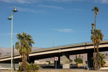 Afternoon view of a road overpass in the urban core of Indio, California, USA.