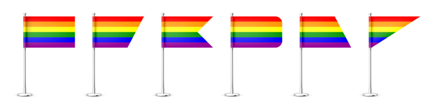 Realistic various table flags on a chrome steel pole. Rainbow LGBT desk flag made of paper or fabric. Shiny metal stand. Mockup for promotion and advertising. Vector illustration