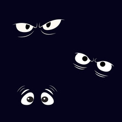 Spooky eyes staring out from the dark