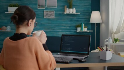 IT student using programming interface and binary code on laptop, learning system data and coding statistics. Young person looking at analysis hacker information on computer screen. - Powered by Adobe