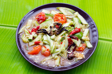 Spicy cucumber salad in plate