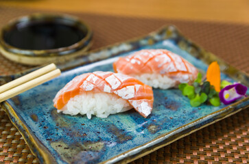 Plate with two elegant nigiri sushi (nigirizushi)