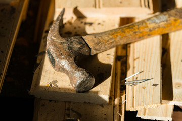 Carpentry tools and material, inflation resource scarcity theme, construction demolition, building and home improvement. Close up detail shot