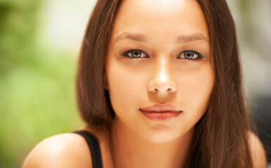 Young and beautiful. Closeup of a beautiful young womans face.