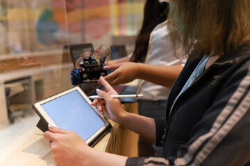 New Generation young studen assembly and programing robot ,Technology education concept