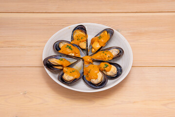 Mussel is the name for members of several families of bivalve molluscs, from saltwater and freshwater habitats. These groups have in common a shell whose contour is elongated and asymmetrical. © Toyakisfoto.photos