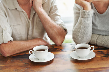 Starting the day with the one I love.... Cropped image of a senior couple enjoying a cup of tea together.