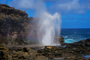 Marine geyser of Nakelele Blowhole on West Maui in the Hawaiian Islands, USA - Spout of water on...