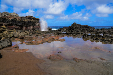 Marine geyser of Nakelele Blowhole on West Maui in the Hawaiian Islands, USA - Spout of water on...