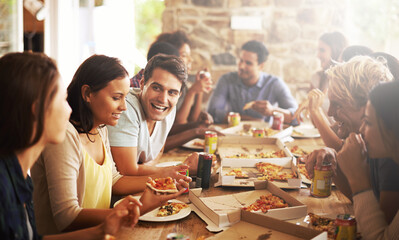 Great friends and food. Cropped shot of a group of friends enjoying pizza together.