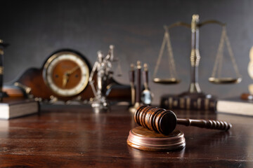 Law and justice concept. War crimes. Gavel, Themis sculpture, law code and scale in lawyers office....