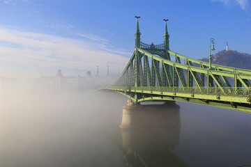 Liberty Bridge known as Szabads&aacute;g h&iacute;d in Budapest Hungary is a bridge that connects Buda and Pest over the River Danube