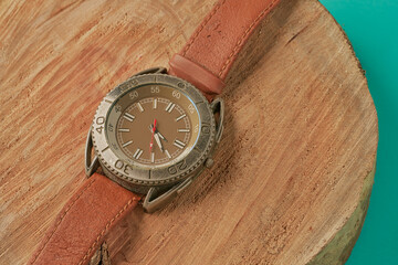 Old smart watch on wood. Male accessories. casual style watch For men.