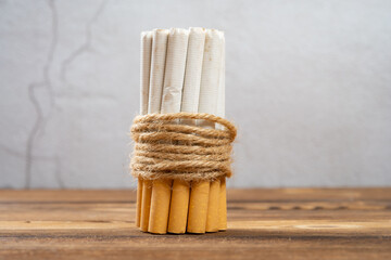 bunch of cigarette on a wood table