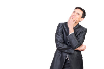 Positive man in formal suit looking up