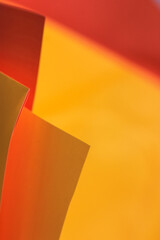 Crumpled yellow orange mustard paper abstract background and texture. Gift wrapping clear paper...