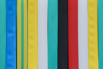 Colored background of multicolored plastic ribbons