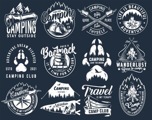 Set of monochrome camping and travel emblems, including campfire, flag, wood, lantern, forest