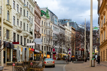 Obraz premium Winter street at daytime in Vienna, Austria. Capital city street.