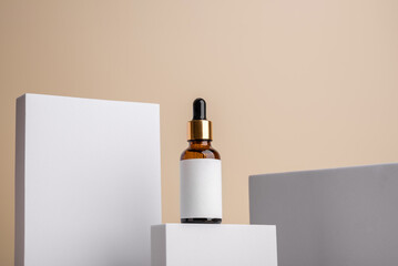 Geometric light composition with glass brown serum with skin care dropper with logo mockup. Health and beauty concept