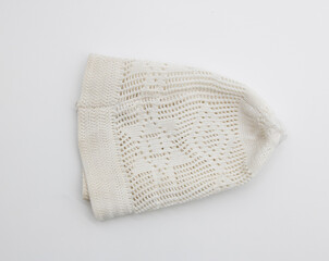 Islamic headdressor or skull-cap usually worn by Muslim men