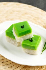 Talam Ketan or Kuih Seri Muka,  Two Layered Dessert with Steamed Glutinous Rice at the Bottom and Green Custard Layer Cake