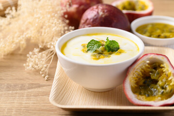 Yogurt with passion fruit in bowl, Healthy eating