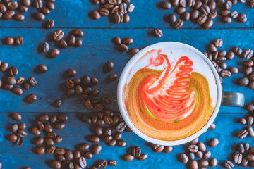 coffee latte art on wood table, relax time, cafe barista art top view.