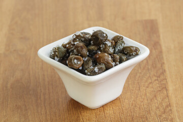 Salted marinated capers snack appetiser