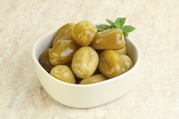 Pickled green tomato in the bowl