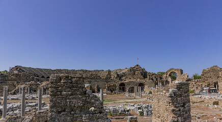 Fototapeta na wymiar Panoramic view of the ruins of Ticaret Agora in Side, Turkey