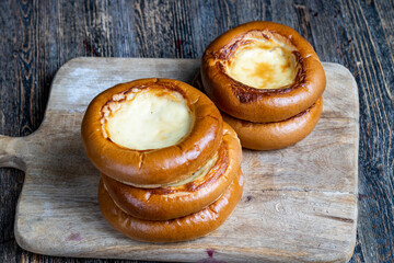 sweet dough pastries with sour cream and milk filling
