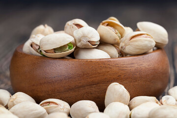 fried salted pistachio nuts , close up