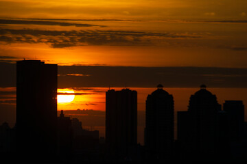 Fototapeta na wymiar Sihlouette Building in Jakarta With Sunset vew