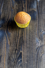 delicious wheat cupcakes on a black wooden table