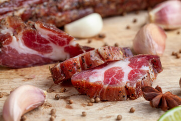pork and bacon sliced during cooking