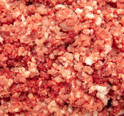 Minced meat and fat as background.