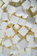 Flat lay macro white sugar cubes close up texture background