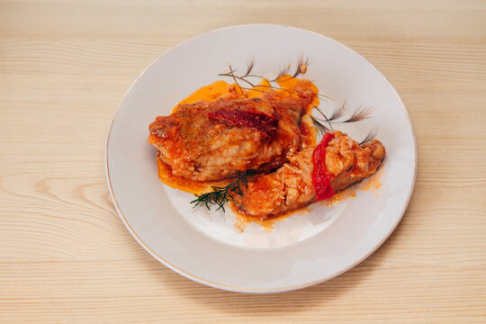 fish with tomato sauce and peppers
