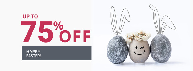 Easter sale banner with easter eggs and rabbit ears.