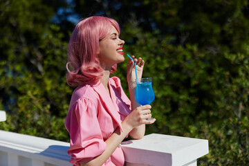 Fototapeta premium attractive woman happiness vacation sunny summer cocktail unaltered