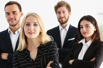 Confident work team people, businesspeople posing for collective picture in company