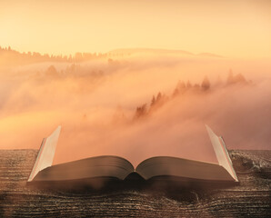 Golden morning fog on the pages of book