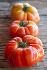 tomatoes on a wooden table