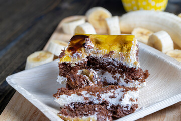 a piece of banana cake and fresh sliced bananas